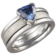 Modern Scaffolding Engagement Ring with Blue Sapphire