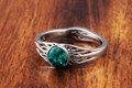 Lab Emerald in a Palladium Tree of Life Engagement Ring with Roots