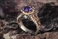 Juicy Vintage Fleur De Lis Engagement Ring with a split shank and gorgeous diamond details