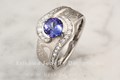 Mokume Pirouette Diamond Engagement Ring with a Blue Sapphire and Twirled Channel-set Diamonds