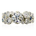 Express yourself with this bubbly ring style! Lightweight and sparkly, this engagement ring is made from bezel-set diamonds clustered together like bubbles.