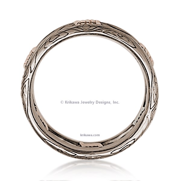 Looking for a masculine, artisan wedding band? How about a gritty ring design reflective of your lifestyle or personality? Our Barbed Wire Wedding Band is the answer. The bars of this ring have a wood-grain pattern, with the "wire" wrapped in-between.