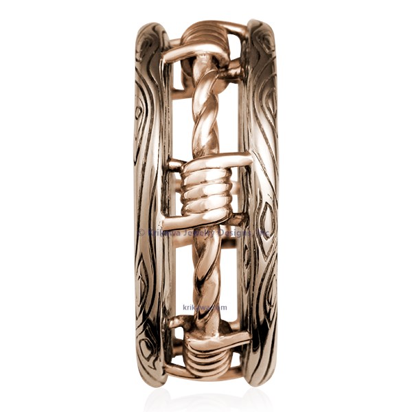 Looking for a masculine, artisan wedding band? How about a gritty ring design reflective of your lifestyle or personality? Our Barbed Wire Wedding Band is the answer. The bars of this ring have a wood-grain pattern, with the "wire" wrapped in-between.