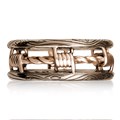 Looking for a masculine, artisan wedding band? How about a gritty ring design reflective of your lifestyle or personality? Our Barbed Wire Wedding Band is the answer. The bars of this ring have a wood-grain pattern, with the "wire" wrapped in-between.