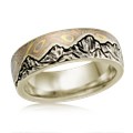 This artisan wedding band has an engraved mountain range, and a sky inlaid with mokume. For a truly one-of-a-kind ring, choose your favorite mokume flavor, and send us a picture of the mountains that have meaning for you!