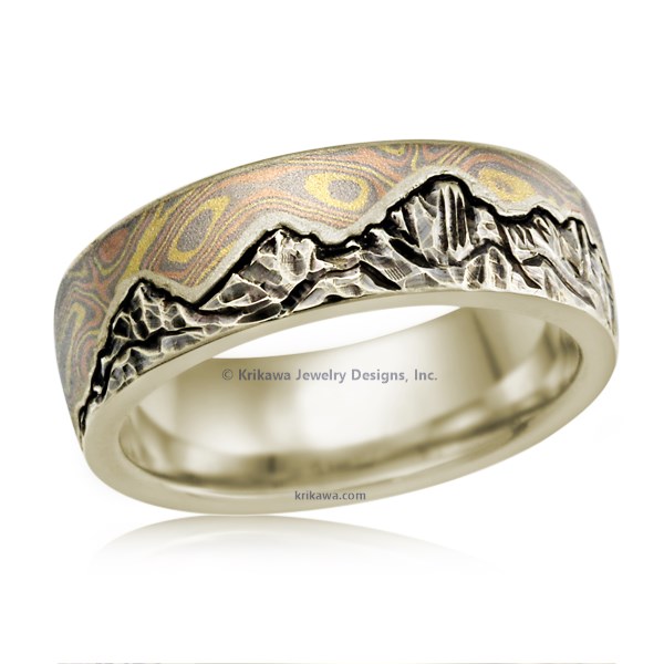 This artisan wedding band has an engraved mountain range, and a sky inlaid with mokume. For a truly one-of-a-kind ring, choose your favorite mokume flavor, and send us a picture of the mountains that have meaning for you!