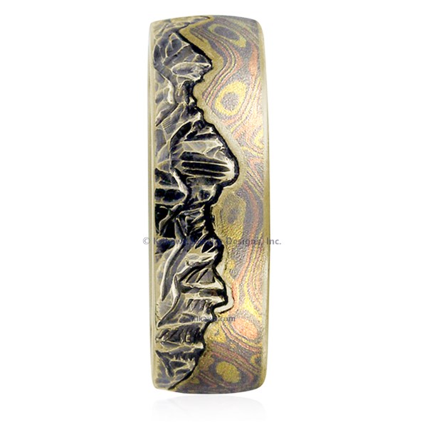 This artisan wedding band has an engraved mountain range, and a sky inlaid with mokume. For a truly one-of-a-kind ring, choose your favorite mokume flavor, and send us a picture of the mountains that have meaning for you!