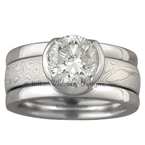 Modern Scaffolding Engagement Ring with Round Diamond and Two Cutout Head with White Mokume Band