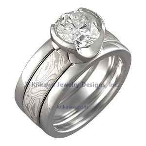 Modern Scaffolding Engagement Ring with Round Diamond and Two Cutout Head with White Mokume Band