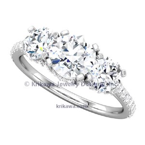 Three Stone Round Cut Engagement Ring With Secret Halos