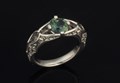 Bat Engagement Ring with Intricate Palladium Bat Wings and a Blue Sapphire