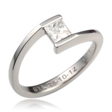Sleek Solitaire Crossover Engagement Ring