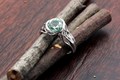 Embracing Tree Branch Bezel Engagement Ring With Montana Sapphire