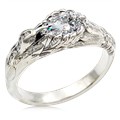  This hummingbird engagement ring is a miniature sculpture in every sense!  The band features a delicate hummingbird's wings cradling the solitaire center stone. Accent stones decorate the bird's head and tail for extra sparkle. 
