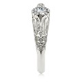  This hummingbird engagement ring is a miniature sculpture in every sense!  The band features a delicate hummingbird's wings cradling the solitaire center stone. Accent stones decorate the bird's head and tail for extra sparkle. 