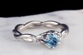 Twisted Leaf Engagement Ring with Blue Diamond