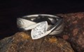 Mokume River Twist Engagement Ring with a White Marquise Diamond