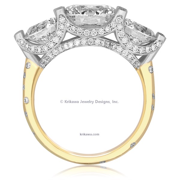 Like the magnificent crowns worn by royalty, this regal engagement ring features pave diamonds that drape around both sides of the three large stones like an elegant tiara.