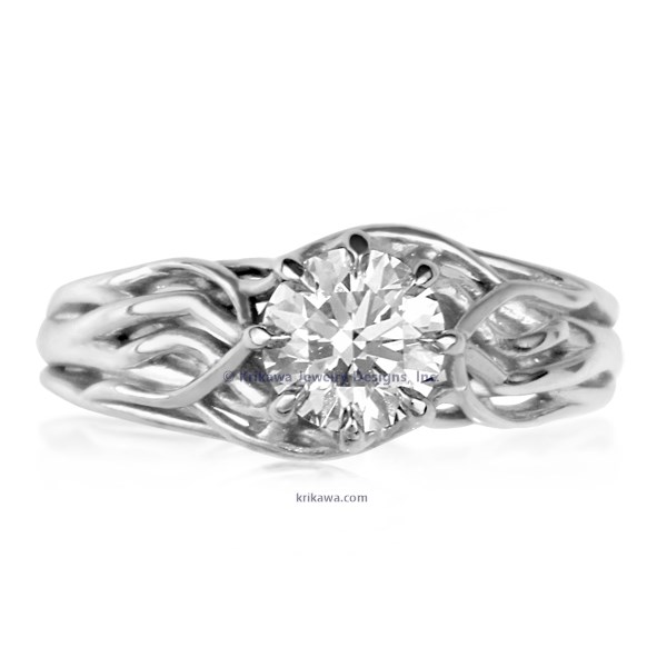 Embracing Tree Branch Engagement Ring With Round Diamond