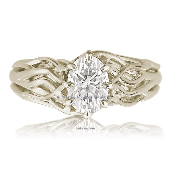 Embracing Tree Branch Engagement Ring With Round Diamond