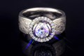 

Mokume Halo Engagement Ring in our classic White Mokume.