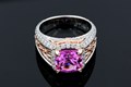 Fleur De Lis Deluxe Engagement Ring with a 3.10ct Pink Sapphire Center Stone.
