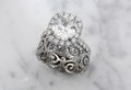 Decadence Infinity Engagement Ring and Carved Infinity Pave Wedding Band Set