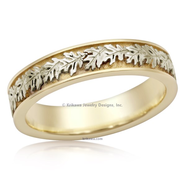A wreath of oak leaves wraps your finger with this petite nature wedding band.