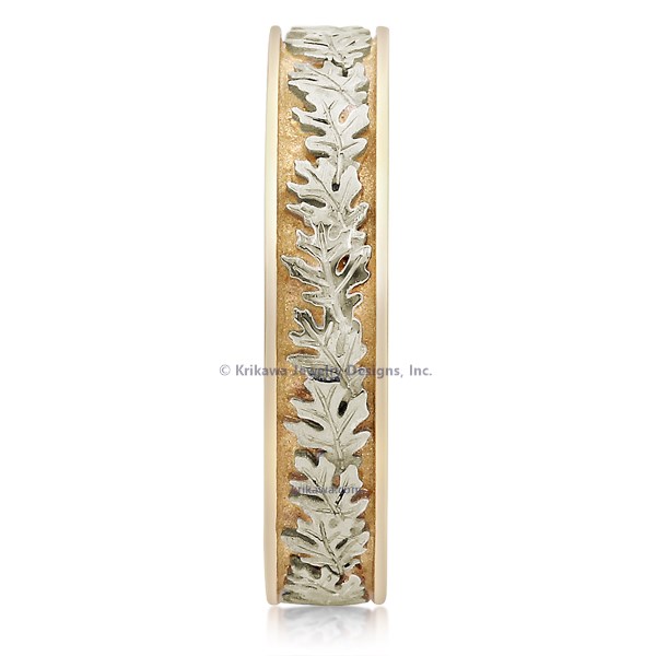 A wreath of oak leaves wraps your finger with this petite nature wedding band.