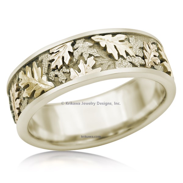 Capture that special time of year and keep it with you forever with this triple-tone oak leaf wedding band.