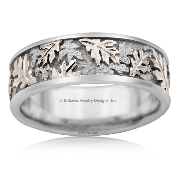 Capture that special time of year and keep it with you forever with this triple-tone oak leaf wedding band.