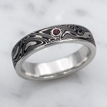 Black And White Mokume Wedding Band With Garnet Accent