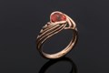 Inspired by the natural brilliance of a spiral galaxy, this unique engagement ring features a solid shank at the base that tapers up and splits of into numerous bands.