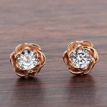 Medium Rose Gold Rose Stud Earrings With Moissanites - top view