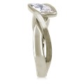 A simplified, modern version of our classic River Twist Engagement Ring this engagement ring features a solitaire stone set at an angle and suspended above a band that flows beneath like a river.