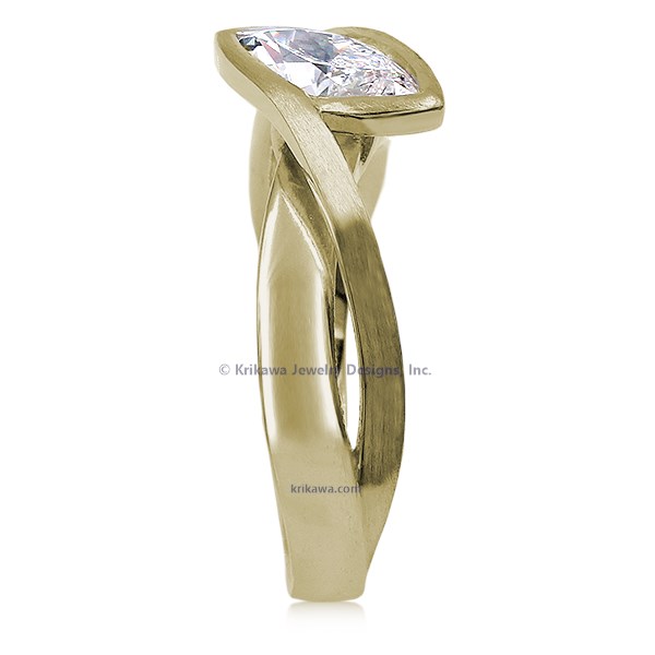 A simplified, modern version of our classic River Twist Engagement Ring this engagement ring features a solitaire stone set at an angle and suspended above a band that flows beneath like a river.