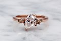 Scattered Mixed Shape Cluster with Pear center stone and champagne accents