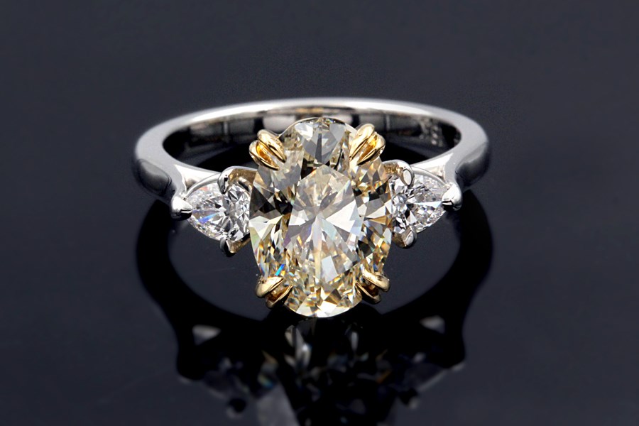 Oval Three-Stone With Pear Prong Engagement Ring