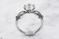 Dolphin Kiss Engagement Ring with Blue Diamonds