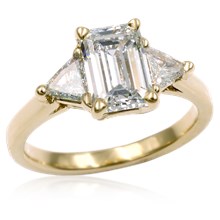 Emerald and Triangle Three-Stone Engagement Ring