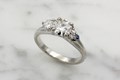 Round Asymmetrical Cluster Engagement Ring