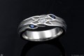 Embracing Brach Three-Stone Accent Wedding Band