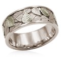  A handcrafted two-toned metal resembles the true love and peace you feel together.