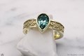 Tibetan Knot Engagement Ring with Green Moissanite Pear