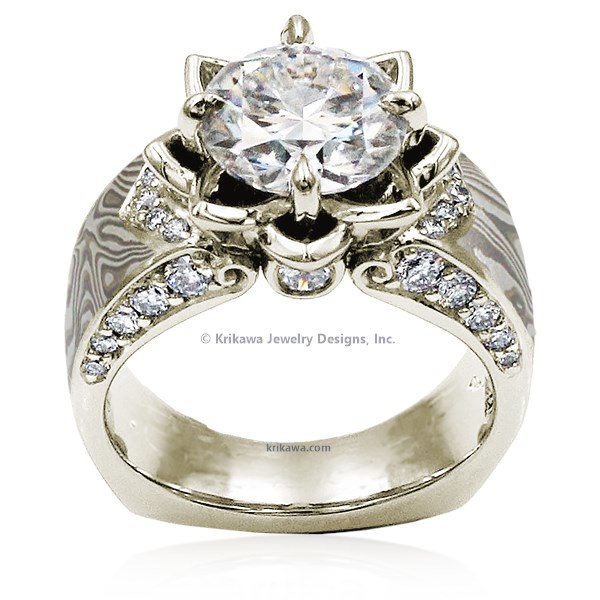 Embrace a love story embodied by the graceful lotus blossom, a symbol of purity and unwavering devotion. Our wider mokume gane ring design, adorned with accent diamonds, highlights the sculptural beauty of the lotus. 