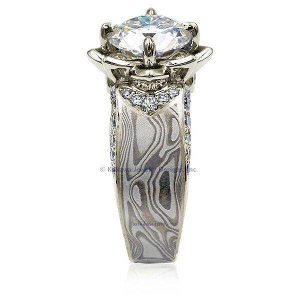 Embrace a love story embodied by the graceful lotus blossom, a symbol of purity and unwavering devotion. Our wider mokume gane ring design, adorned with accent diamonds, highlights the sculptural beauty of the lotus. 