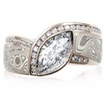 Mokume Wave Diamond Crossing Engagement Ring with blue diamond