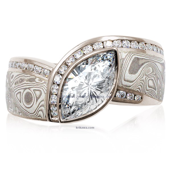 Mokume Wave Diamond Crossing Engagement Ring with blue diamond