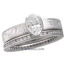 Mokume Solitaire Straight Tapered Engagement Ring with an Oval Diamond and Diamond Channel Brilliant Eternity Band