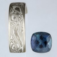 Cushion Cut Malaui Sapphire with White Mokume Gane